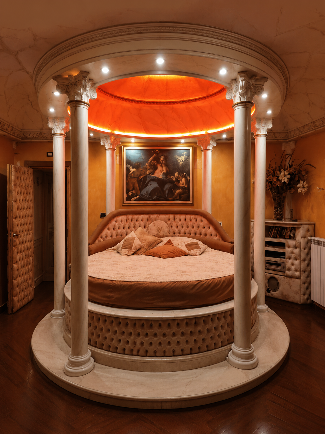 Suite degli sposi con letto rotondo e atmosfera romantica